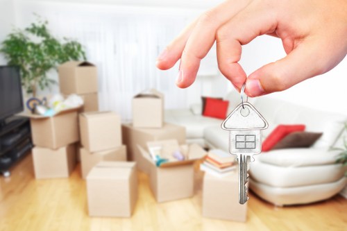 Professional movers carrying furniture during a Marylebone relocation