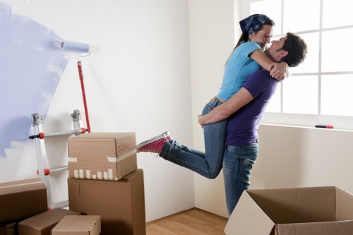 Professional movers protecting furniture during a Marylebone flat move