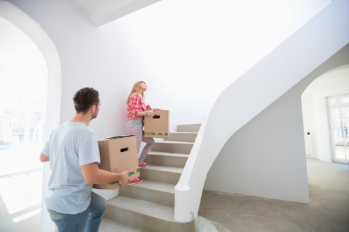 Professional mover carrying furniture in Marylebone